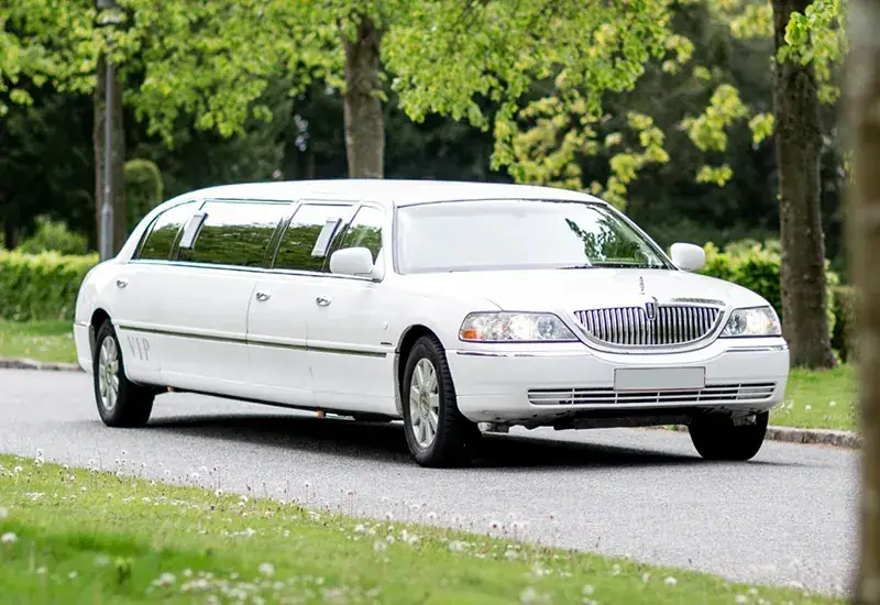 White Lincoln Town Car stretch limousine for prom limo rental